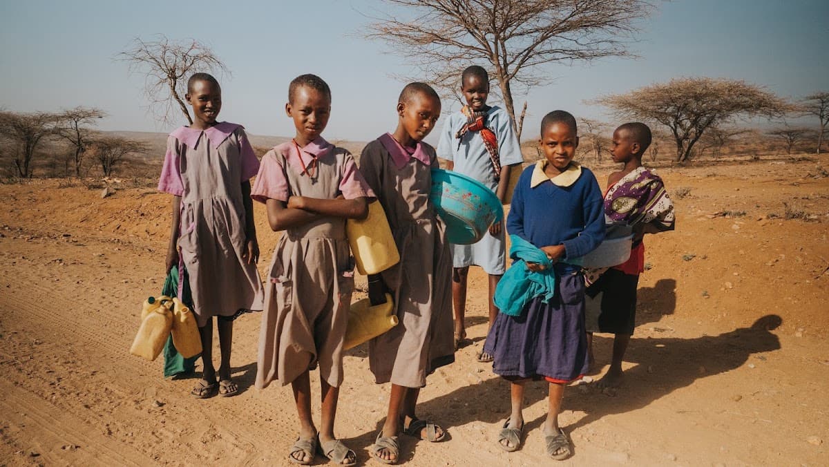 A person carrying water over a long distance